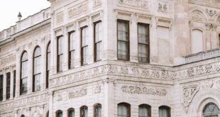 Detailed view of Dolmabahçe Palace's ornate facade in Istanbul, showcasing historic architectural elegance.