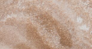 Elegant close-up of granite stone texture, perfect for backgrounds and design projects.