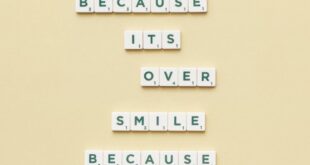 Motivational quote using letter tiles on a plain background, inspiring positivity.