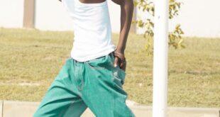 Casual street fashion photoshoot of a young man in Accra, Ghana.